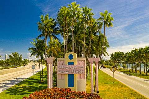 This is a stock photo from Shutterstock. This is a photo of the "Welcome to Miami Beach" sign on the road entering Miami Beach.